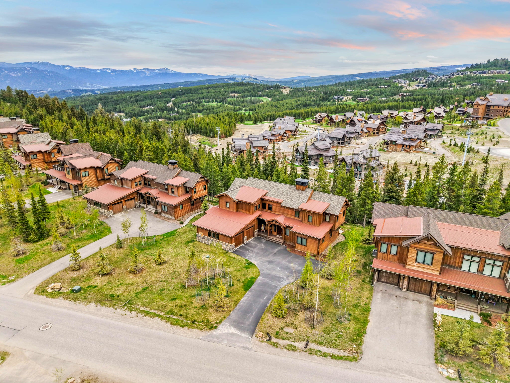 Row of homes taken from a drone overlooking the Gallatin Mountains in Spanish Peaks Mountain Club, Montana